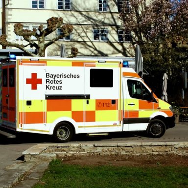 ambulance truck parked near building 3960411