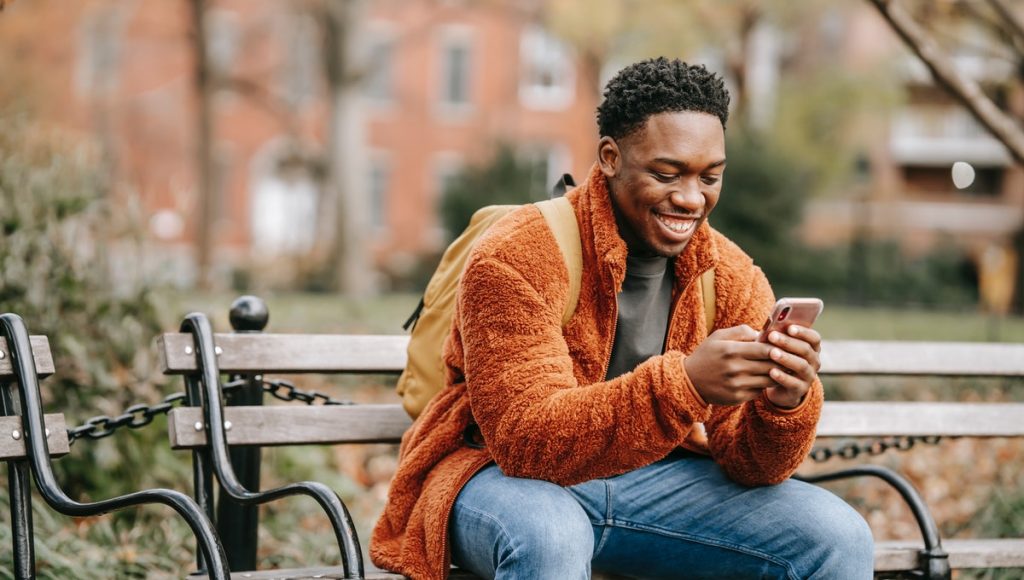 black person on phone